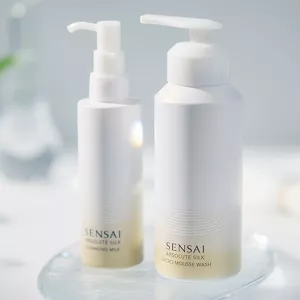 Absolute Silk Double Cleansing product bottles shown beside each other in lifestyle setting